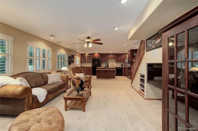 10032 Astoria Ct, Lone Tree, CO 80124 - living room with light carpet, recessed lighting, and a ceiling fan