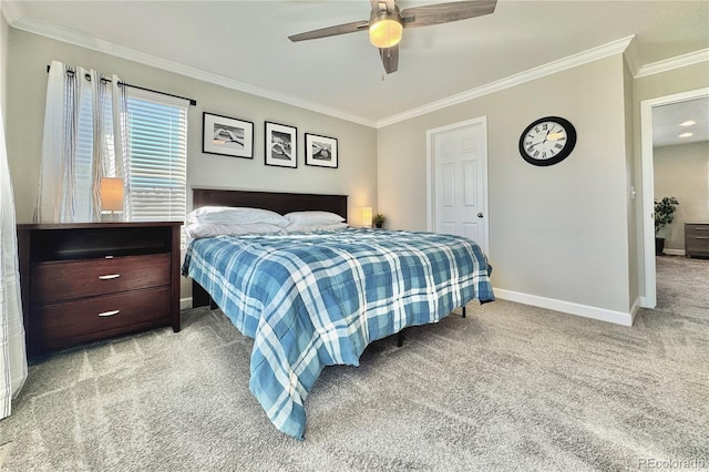 carpeted bedroom featuring crown molding and ceiling fan