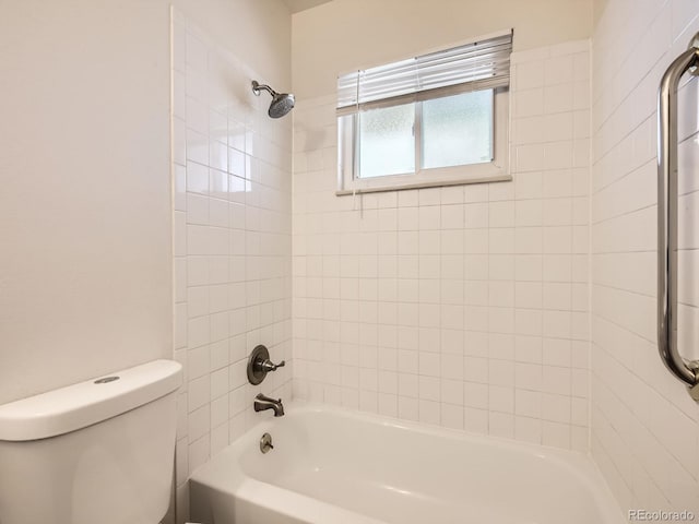 full bathroom featuring washtub / shower combination and toilet