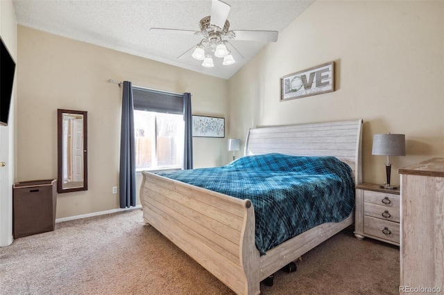 carpeted bedroom featuring ceiling fan, vaulted ceiling, and a textured ceiling