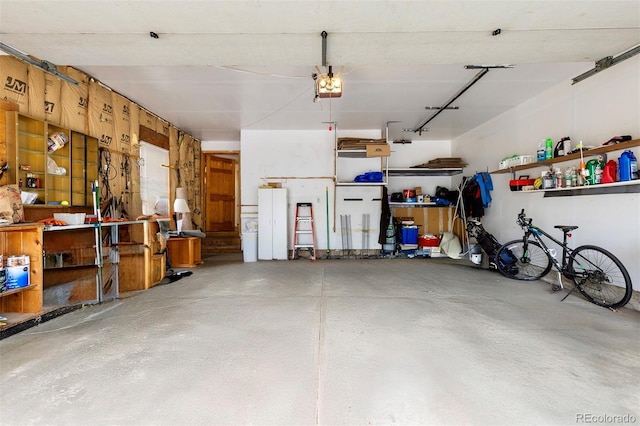 2650 S Vaughn Way Unit B, Aurora, CO 80014 - garage with a garage door opener