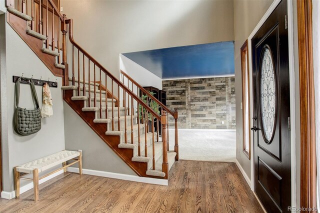 10059 Granite Hill Dr, Parker, CO 80134 - foyer featuring stairs, baseboards, and wood finished floors