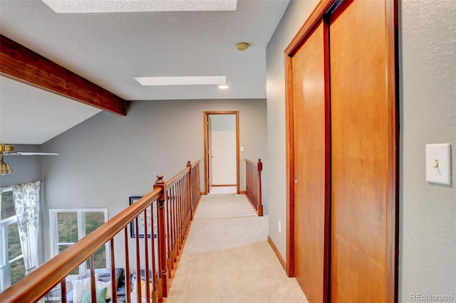 10059 Granite Hill Dr, Parker, CO 80134 - hall with recessed lighting, a textured ceiling, lofted ceiling with beams, an upstairs landing, and light colored carpet