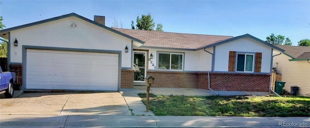8721 W 86th Ave, Arvada, CO 80005 - ranch-style house with brick siding, a garage, concrete driveway, a chimney, and a shingled roof