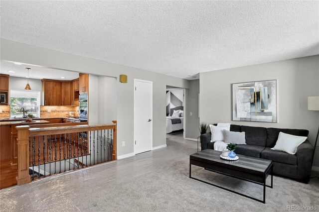 8721 W 86th Ave, Arvada, CO 80005 - living room with a textured ceiling and recessed lighting