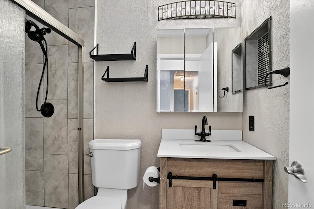 8721 W 86th Ave, Arvada, CO 80005 - full bathroom with vanity, a textured wall, and a stall shower