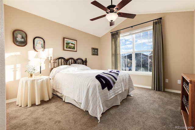 bedroom featuring vaulted ceiling, carpet floors, ceiling fan, and a mountain view