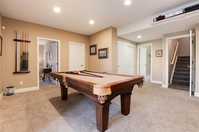 game room with pool table and light carpet