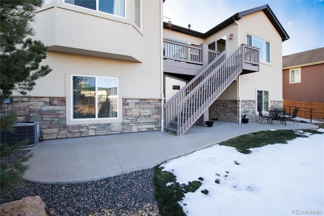 back of property featuring a patio area and central AC unit