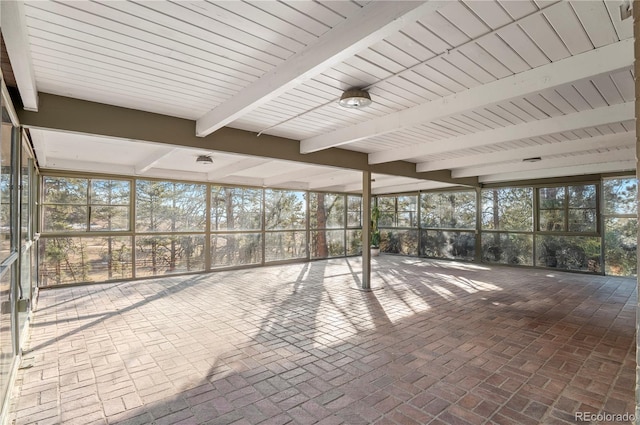 unfurnished sunroom with a healthy amount of sunlight