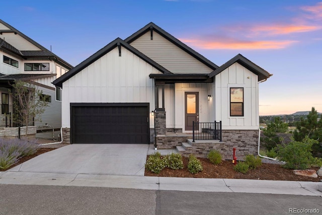 7022 Homeplace St, Castle Rock, CO 80108 - modern farmhouse style home with board and batten siding, an attached garage, driveway, and stone siding