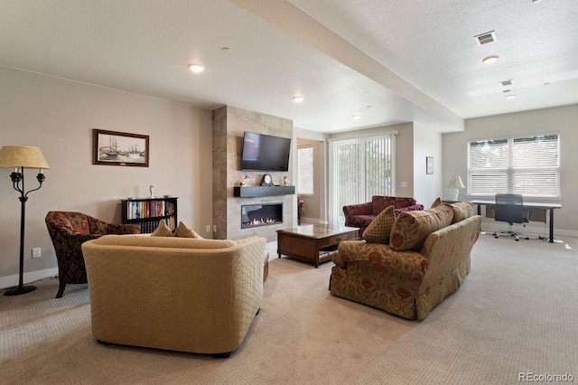 7022 Homeplace St, Castle Rock, CO 80108 - living room featuring light colored carpet, baseboards, a fireplace, and an office area