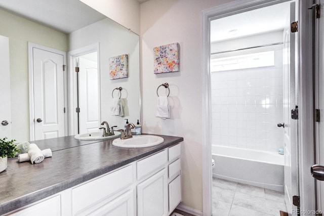 bathroom featuring toilet, tile patterned flooring,  shower combination, and vanity