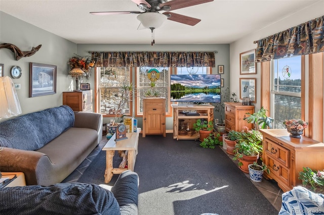 living room featuring ceiling fan