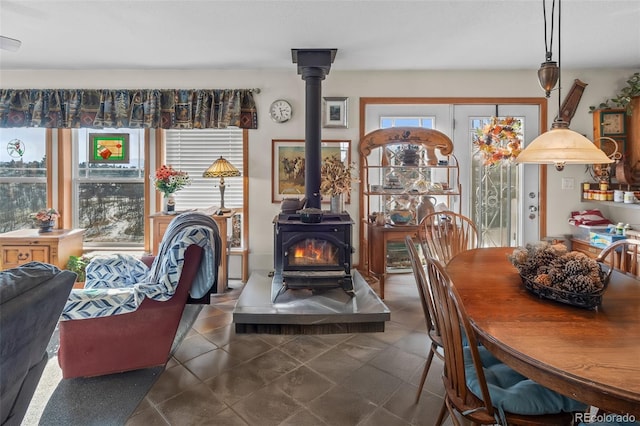 dining room featuring a wood stove