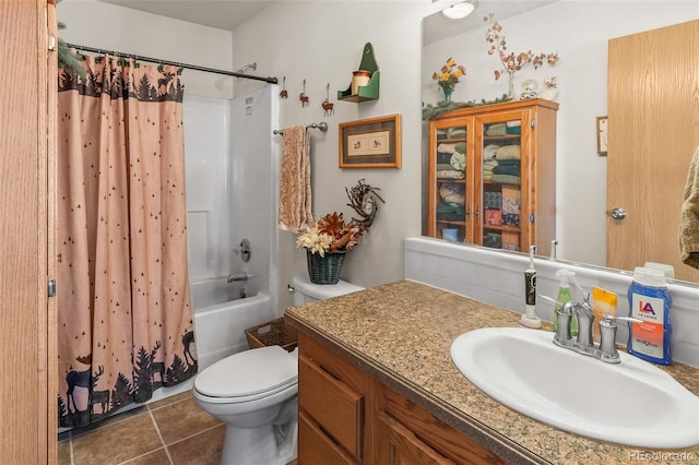 full bathroom with tile patterned floors, vanity, toilet, and shower / bath combo