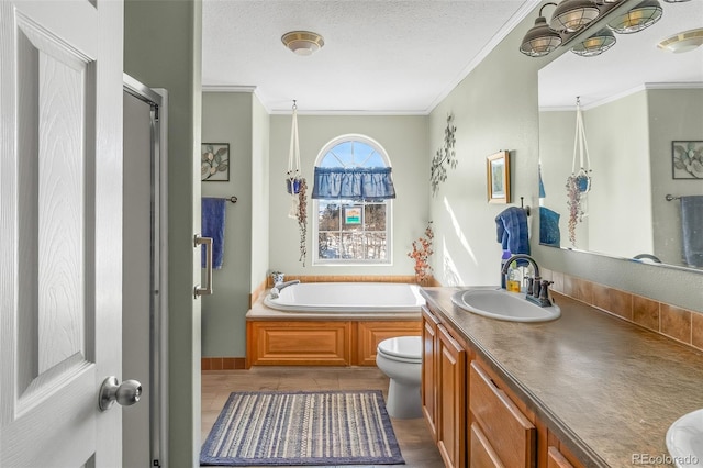 full bathroom featuring vanity, crown molding, and a textured ceiling