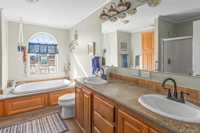 full bathroom with wood-type flooring, ornamental molding, toilet, and plus walk in shower