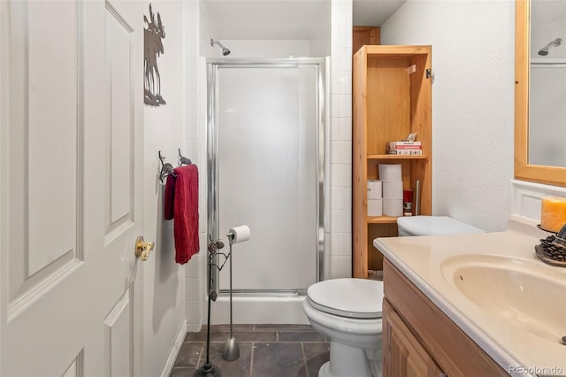 bathroom with walk in shower, vanity, toilet, and tile patterned flooring