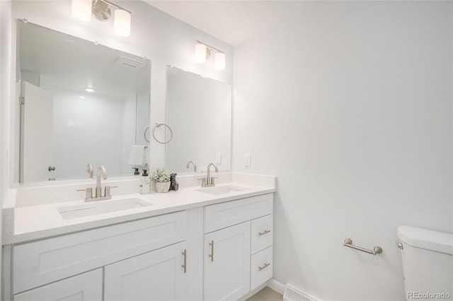 9345 W Iowa Pl, Lakewood, CO 80232 - full bath with double vanity and toilet