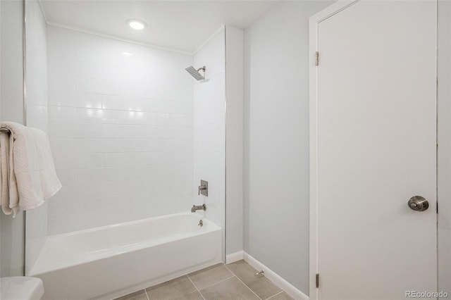 9345 W Iowa Pl, Lakewood, CO 80232 - bathroom with baseboards, shower / bath combination, tile patterned floors, and toilet