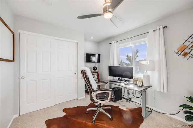 office featuring light colored carpet and ceiling fan