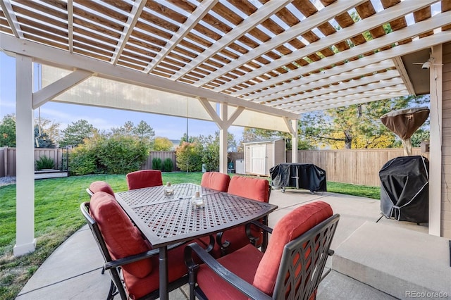 view of patio with a storage unit, a grill, and a pergola