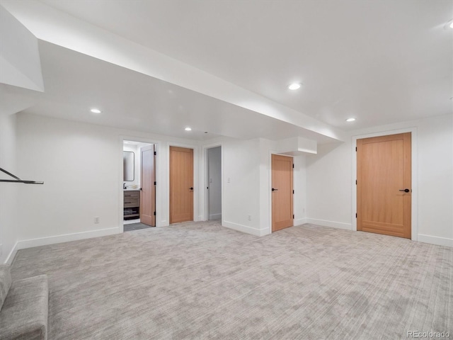 11569 W 27th Ave, Lakewood, CO 80215 - finished basement featuring recessed lighting, baseboards, and light carpet