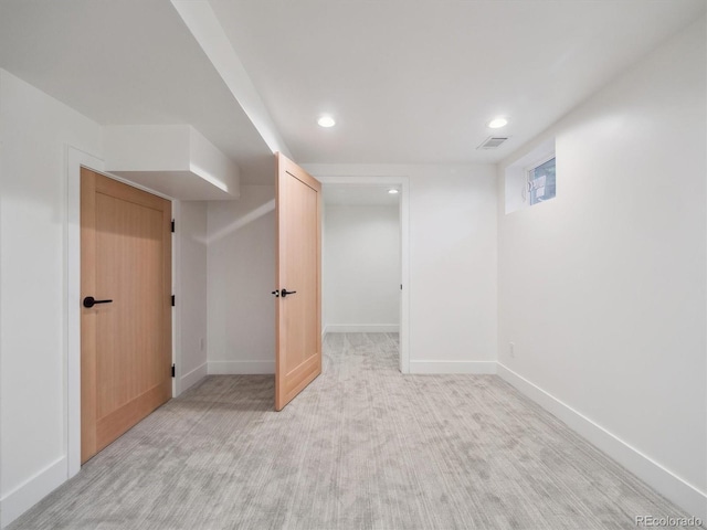 11569 W 27th Ave, Lakewood, CO 80215 - finished below grade area featuring recessed lighting, baseboards, and light carpet