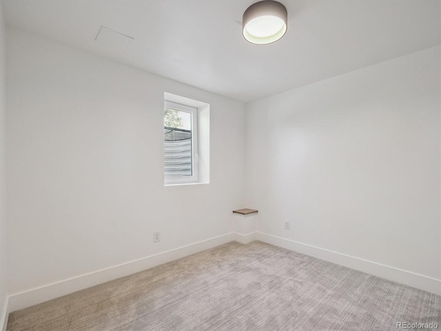 11569 W 27th Ave, Lakewood, CO 80215 - unfurnished room featuring light carpet and baseboards