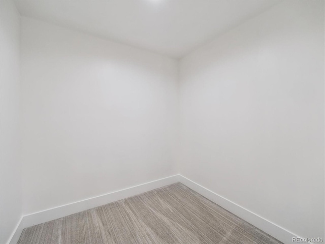 11569 W 27th Ave, Lakewood, CO 80215 - empty room with baseboards and light colored carpet
