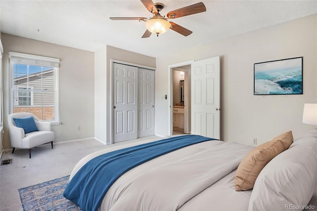 carpeted bedroom featuring baseboards, a closet, and ceiling fan