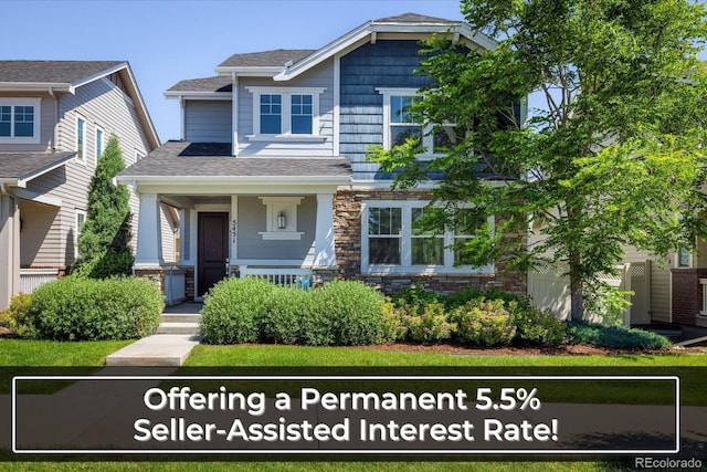 5451 W 73rd Ave, Westminster, CO 80003 - craftsman inspired home with a porch, a shingled roof, and stone siding