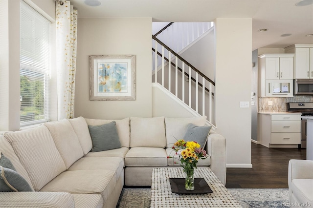 5451 W 73rd Ave, Westminster, CO 80003 - living area with dark wood-style flooring and stairs
