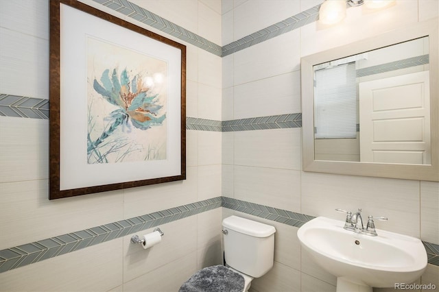 5451 W 73rd Ave, Westminster, CO 80003 - bathroom with tile walls and tasteful backsplash