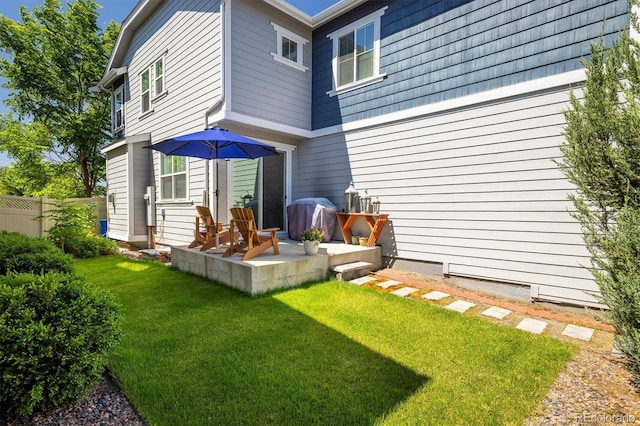 5451 W 73rd Ave, Westminster, CO 80003 - back of property featuring a patio area