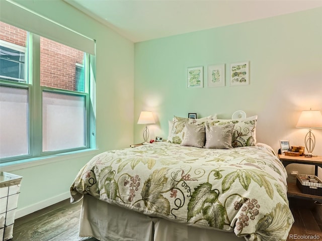 bedroom featuring wood-type flooring