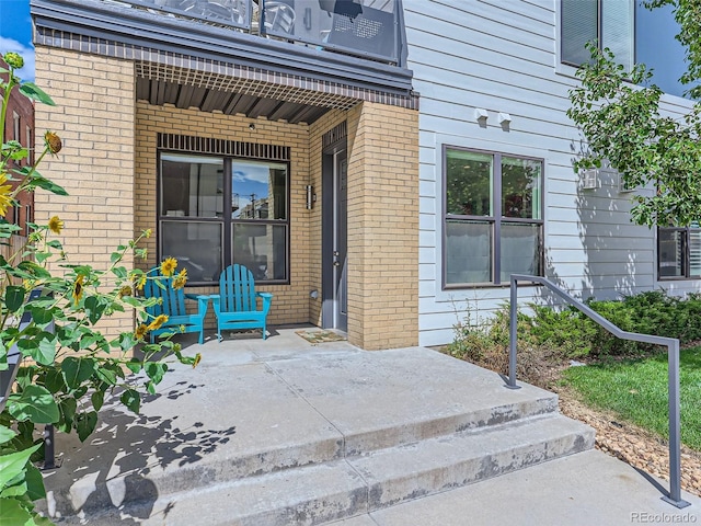 entrance to property with a patio area