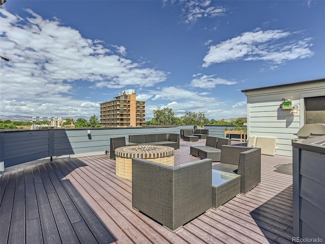 wooden deck with an outdoor hangout area