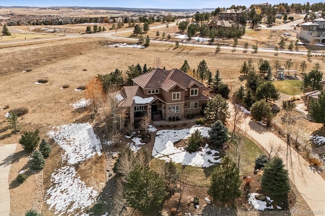 birds eye view of property with a rural view