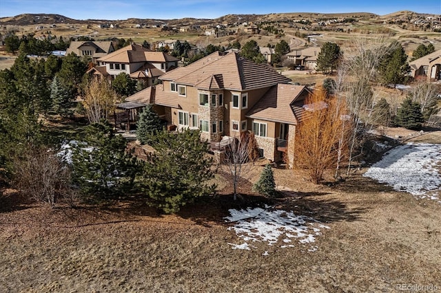 exterior space featuring a residential view and a mountain view