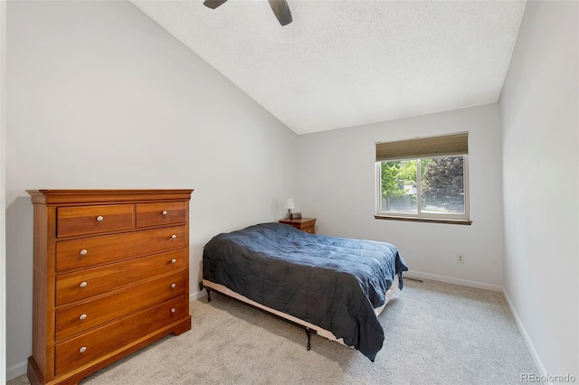 7226 S Eagles Nest Cir, Littleton, CO 80127 - bedroom with lofted ceiling, light colored carpet, baseboards, a textured ceiling, and a ceiling fan