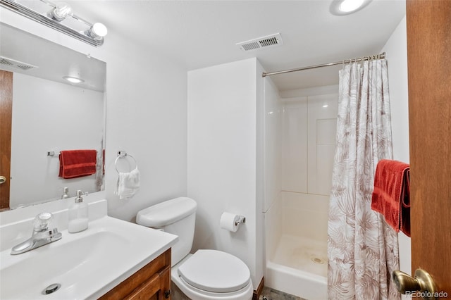 7226 S Eagles Nest Cir, Littleton, CO 80127 - bathroom featuring vanity, a stall shower, and toilet