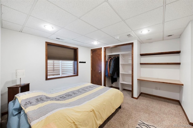 7226 S Eagles Nest Cir, Littleton, CO 80127 - carpeted bedroom with a paneled ceiling, baseboards, a closet, and recessed lighting