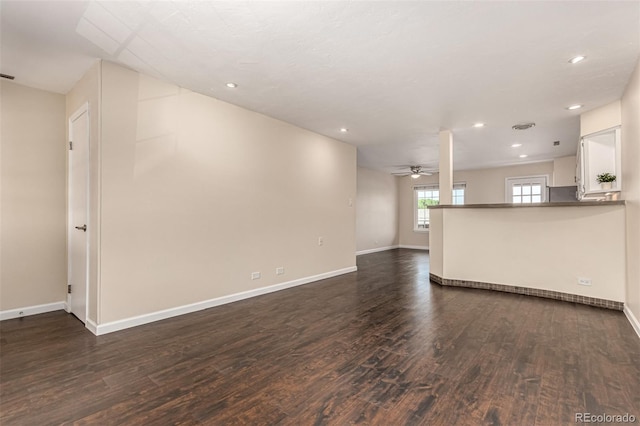 2301 E Fremont Ave Unit W08, Centennial, CO 80122 - unfurnished living room with ceiling fan, dark wood finished floors, and recessed lighting