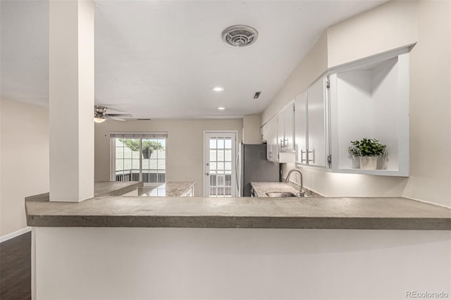 2301 E Fremont Ave Unit W08, Centennial, CO 80122 - kitchen with freestanding refrigerator, ceiling fan, white cabinetry, recessed lighting, and dark wood-style floors