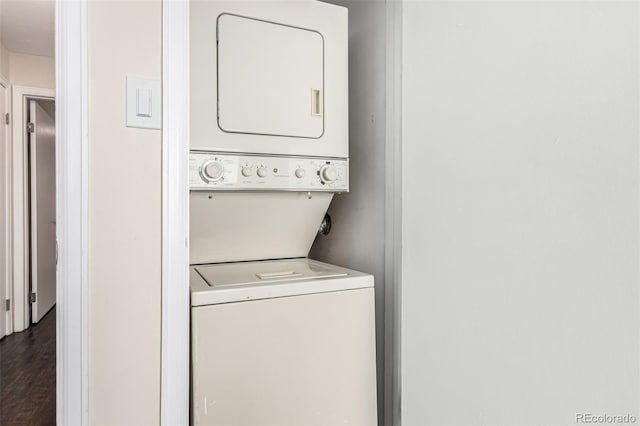 2301 E Fremont Ave Unit W08, Centennial, CO 80122 - washroom featuring stacked washer and clothes dryer