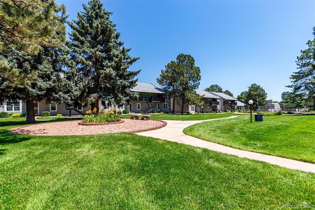 2301 E Fremont Ave Unit W08, Centennial, CO 80122 - surrounding community with a yard and a residential view