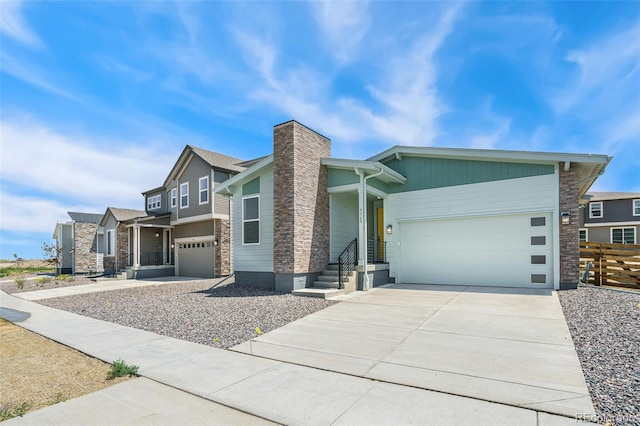 9360 Bahama Ct, Commerce City, CO 80022 - view of front of house with a chimney, concrete driveway, an attached garage, and stone siding