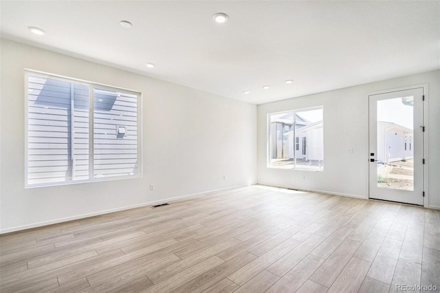 9360 Bahama Ct, Commerce City, CO 80022 - spare room featuring light wood finished floors and recessed lighting
